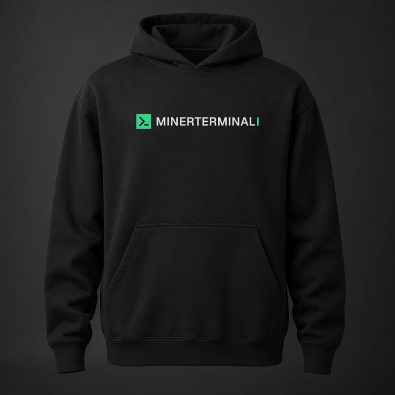 Mockup of a black pullover hoodie with the full MinerTerminal logo, the green terminal prompt mark and the wordmark